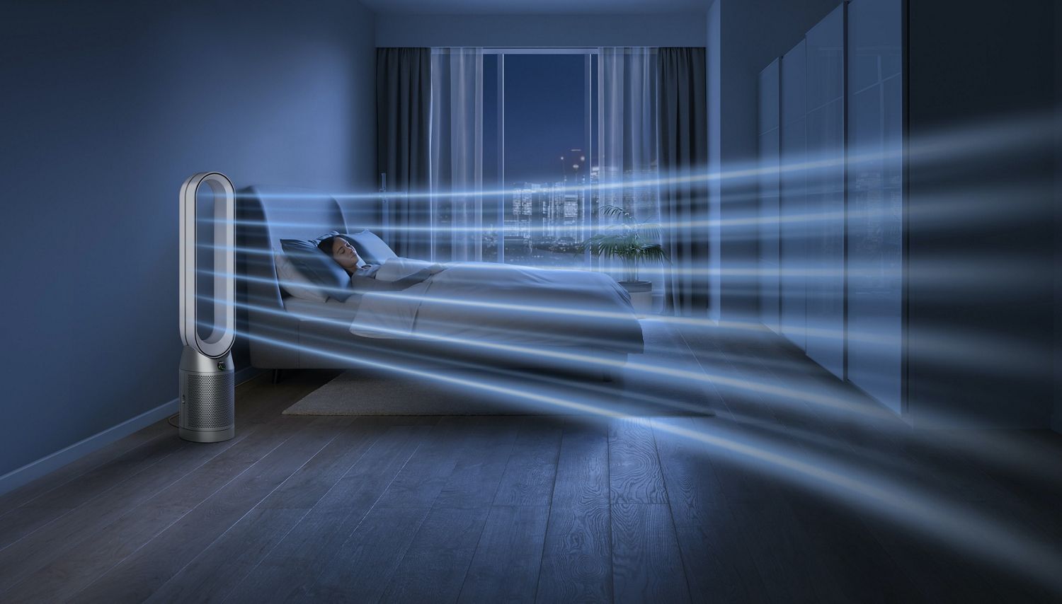 Purificatore d'aria accanto al letto di una donna durante la notte mentre dorme